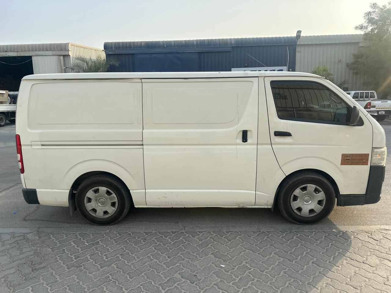 White Toyota Hiace cargo van — Dubai Van Movers fleet